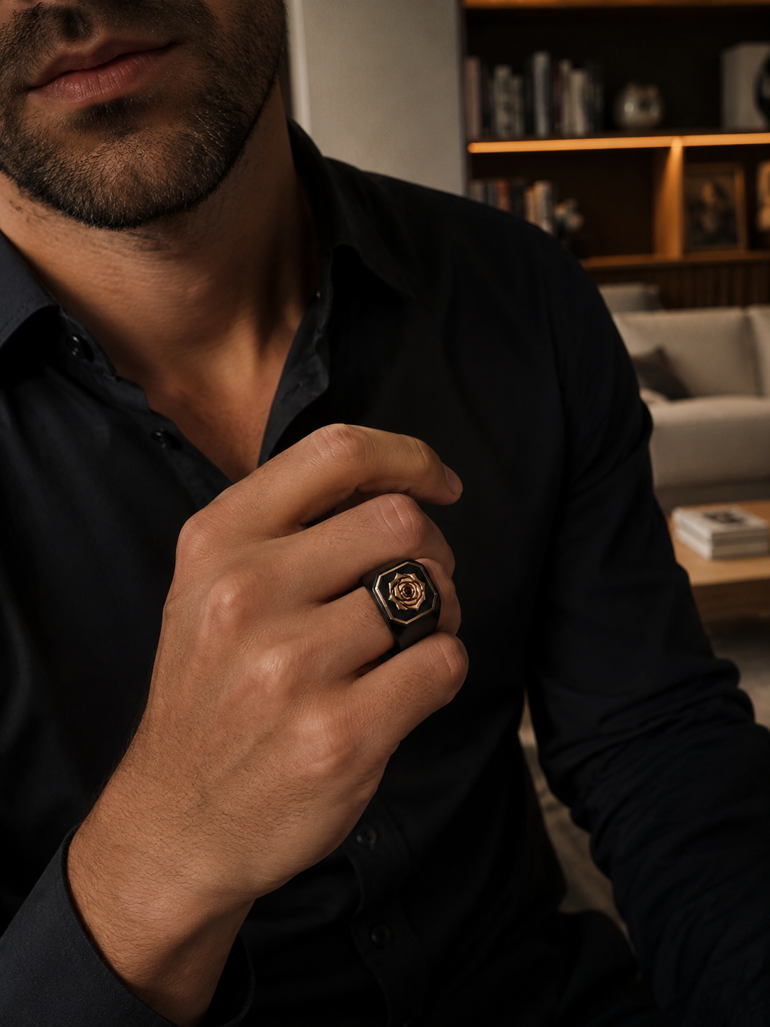 FOUNDER FROM DUBAI WEARING THE RECKONING BLACK RHODIUM SIGNET RING, STERLING SILVER RING, 18K GOLD VERMEIL ROSE, RUBY AT CENTER