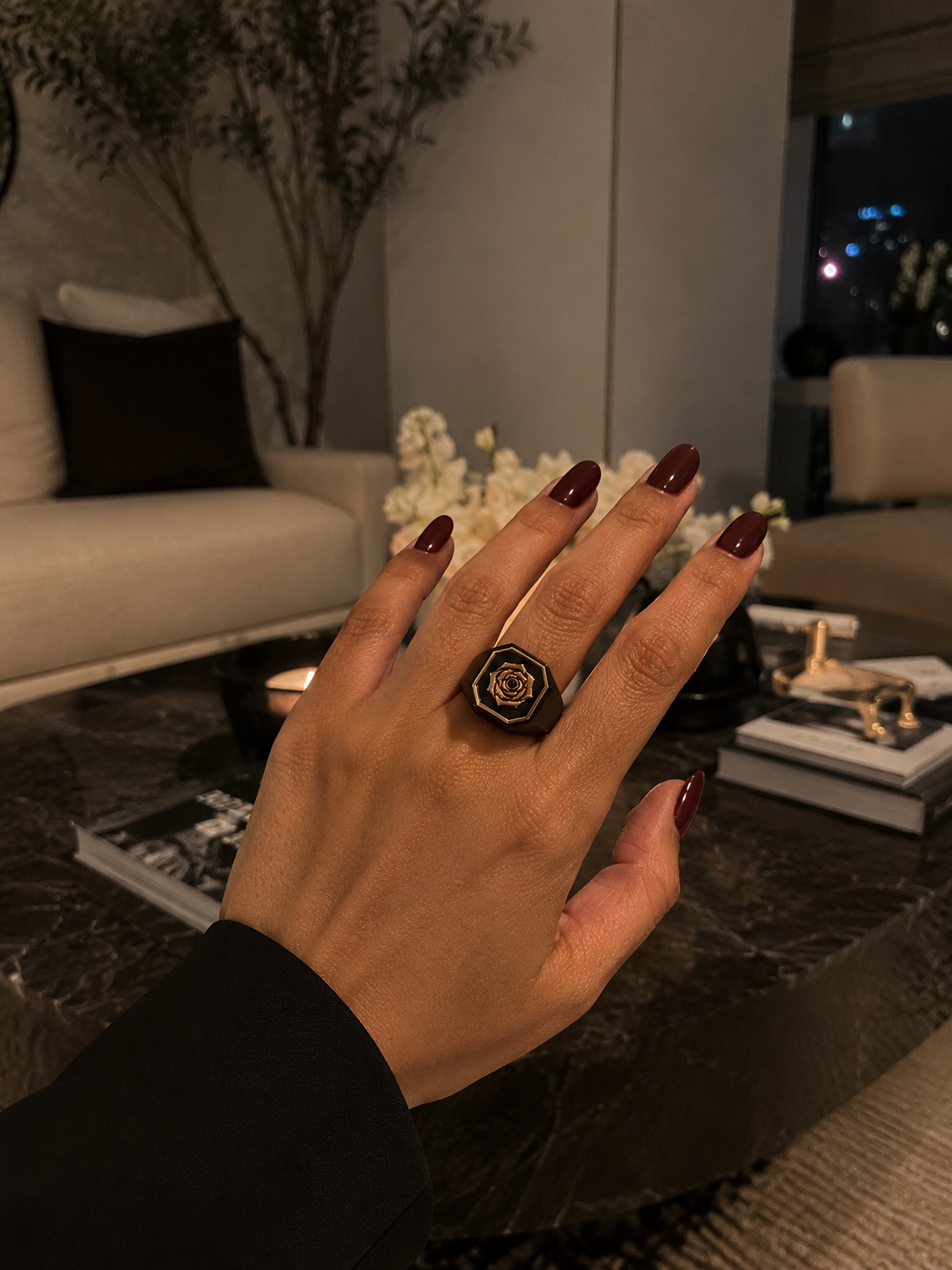 WOMAN FROM UNITED STATES WEARING THE RECKONING BLACK RHODIUM SIGNET RING | STERLING SILVER RING | 18K GOLD VERMEIL ROSE | RUBY AT CENTER
