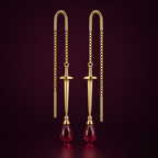 Front view of The Sovereign sword threader earrings in solid 18k gold with briolette ruby drop, from the Aurkhem collection by Eliza.